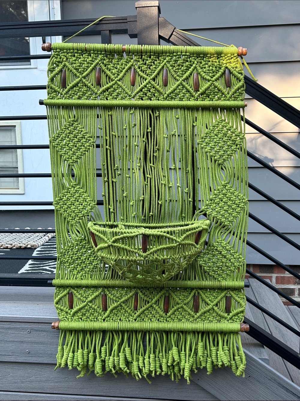 Vintage green macrame wall hanging w/ decorative plant pocket & wooden beads